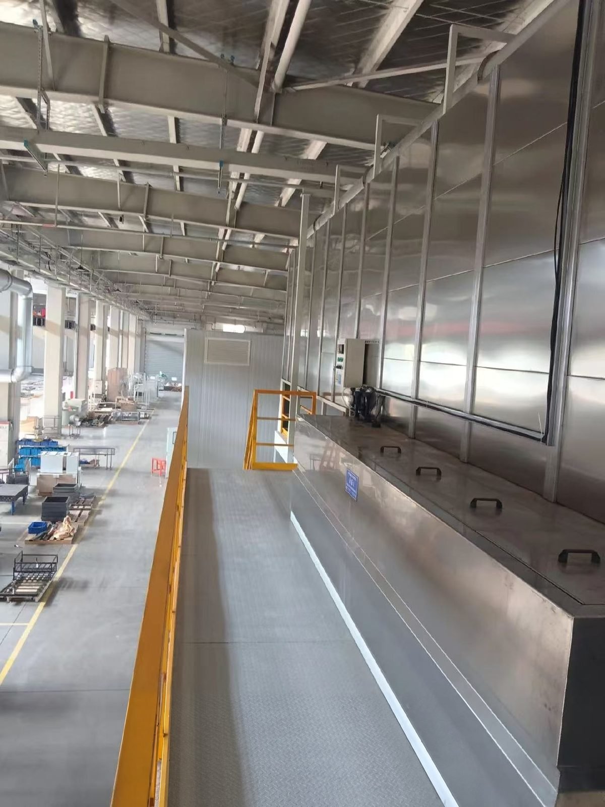 Pretreatment tanks with maintenance walkway